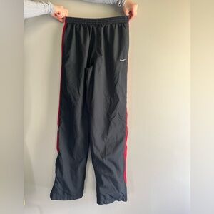 Nike Kids Black Joggers with Red Accents